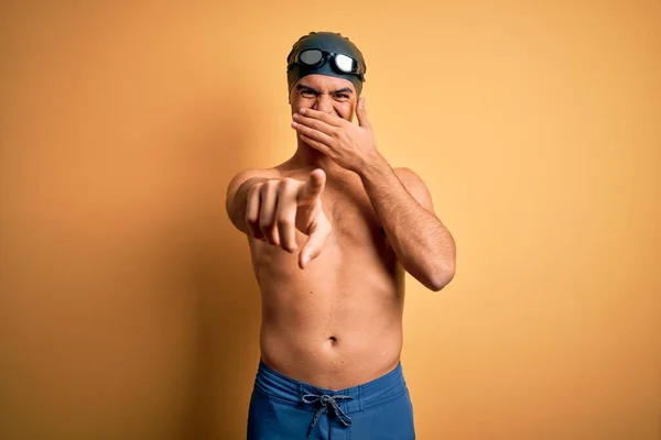 Young Handsome Man Shirtless Wearing Swimsuit Swim Cap Isolated Yellow — Stock Photo, Image