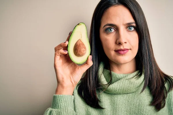 Young Woman Blue Eyes Holding Middle Healthy Avocado Isolated White — Stock Photo, Image