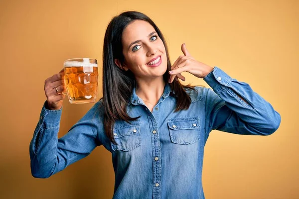 Young Woman Blue Eyes Drinking Jar Beer Standing Isolated Yellow — Stock Photo, Image