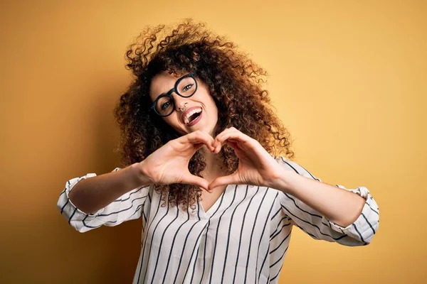 Young Beautiful Woman Curly Hair Piercing Wearing Striped Shirt Glasses — Stock Photo, Image