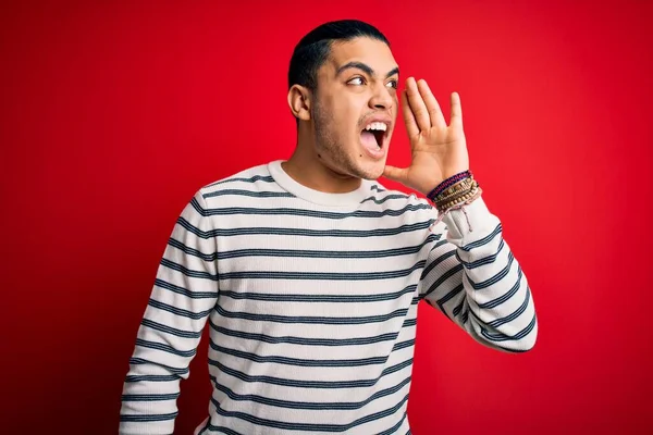 Young Brazilian Man Wearing Casual Striped Shirt Standing Isolated Red — Stock Photo, Image