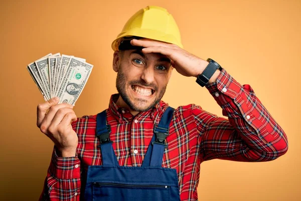Young Builder Man Wearing Safety Helmet Holding Dollars Payment Yellow — Stock Photo, Image