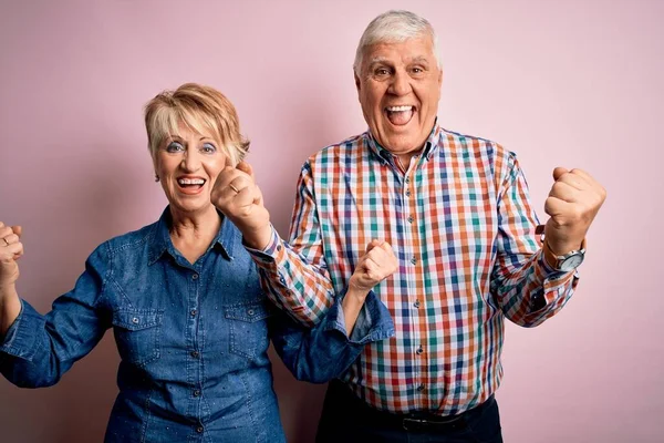 Senior Beautiful Couple Standing Together Isolated Pink Background Celebrating Surprised — Stock Photo, Image