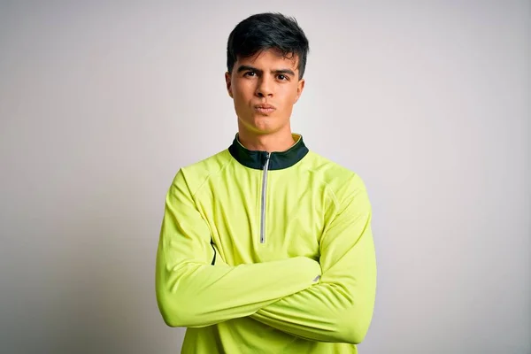 Joven Deportista Guapo Haciendo Deporte Usando Ropa Deportiva Sobre Fondo —  Fotos de Stock