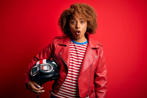 Young African American Motocyclist Woman Holding Motorcycle Helmet Red Background — Stock Photo, Image