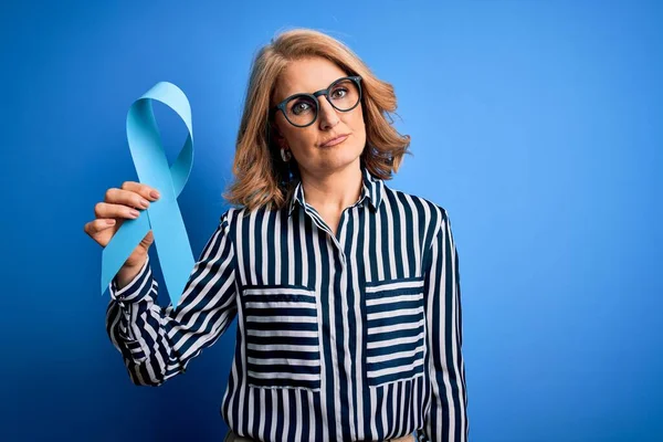 Middle Age Beautiful Blonde Woman Wearing Glasses Holding Blue Cancer — Stock Photo, Image