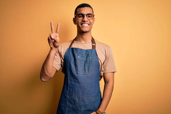 Young Handsome African American Shopkeeper Man Wearing Apron Yellow Background — Stock Photo, Image