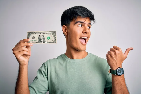 Young Handsome Man Holding One Dollar Banknotes Isolated White Background — Stock Photo, Image