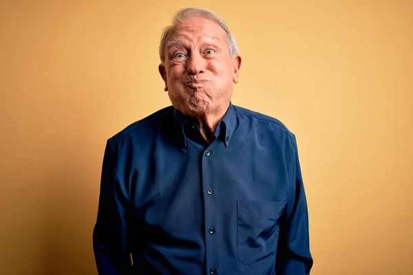 Grey Haired Senior Man Wearing Casual Blue Shirt Standing Yellow — Stock Photo, Image