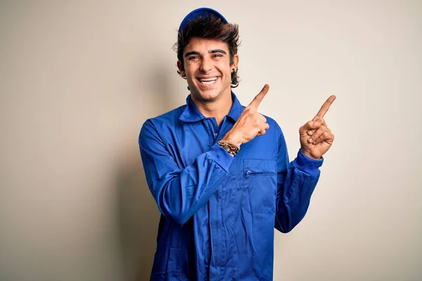 Young Mechanic Man Wearing Blue Cap Uniform Standing Isolated White — Stock Photo, Image