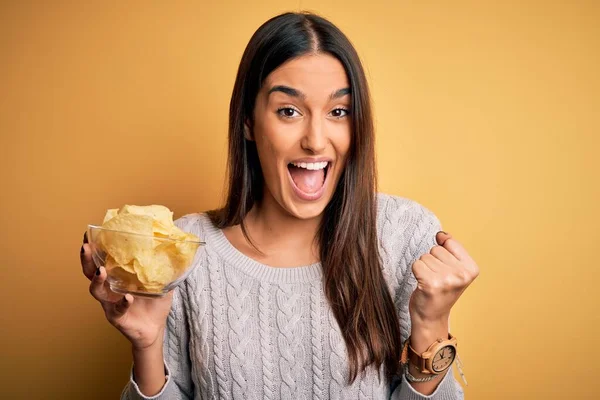 Young Beautiful Brunette Woman Holding Bowl Snack Potato Chips Yellow — Stock Photo, Image