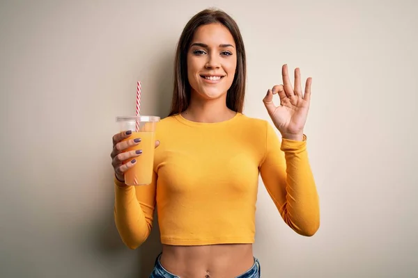 Young Beautiful Brunette Woman Drinking Healthy Orange Juice White Background — Stock Photo, Image