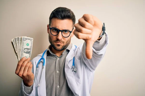 Jonge Dokter Man Houdt Een Bos Van Een Dollar Bankbiljetten — Stockfoto