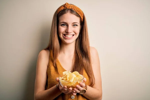 Young Beautiful Redhead Woman Holding Bowl Potato Chips Isolated White — Stock Photo, Image
