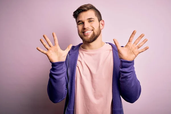 Young Blond Man Beard Blue Eyes Wearing Purple Sweatshirt Pink — Stock Photo, Image