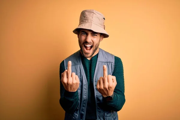 Handsome Tourist Man Beard Vacation Wearing Explorer Hat Yellow Background — Φωτογραφία Αρχείου