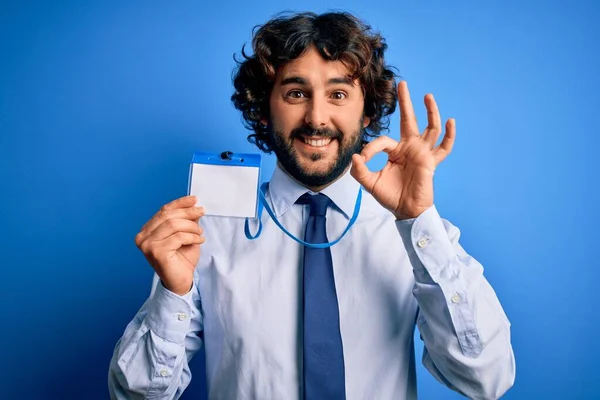Young Handsome Business Man Beard Holding Card Identification Blue Background — Stock Photo, Image