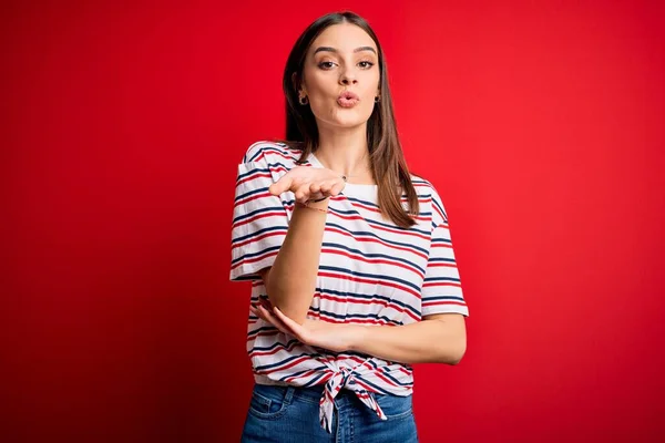 Young Beautiful Brunette Woman Wearing Casual Striped Shirt Standing Red — Stock Photo, Image