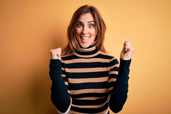 Young Beautiful Brunette Woman Wearing Striped Turtleneck Sweater Yellow Background — Stock Photo, Image