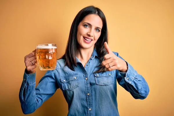 Young Woman Blue Eyes Drinking Jar Beer Standing Isolated Yellow — Stock Photo, Image