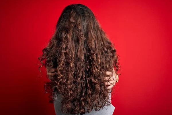 Young Beautiful Woman Curly Hair Wearing Casual Sweatshirt Isolated Red — Stock Photo, Image