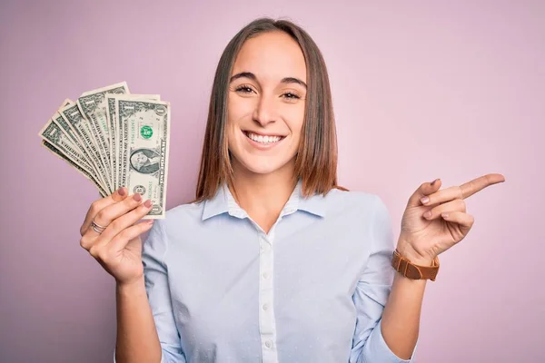 Young Beautiful Woman Holding Bunch Dollars Banknotes Isolated Pink Background — Stock Photo, Image