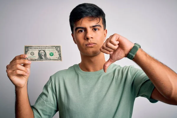 Young Handsome Man Holding One Dollar Banknotes Isolated White Background — Stock Photo, Image