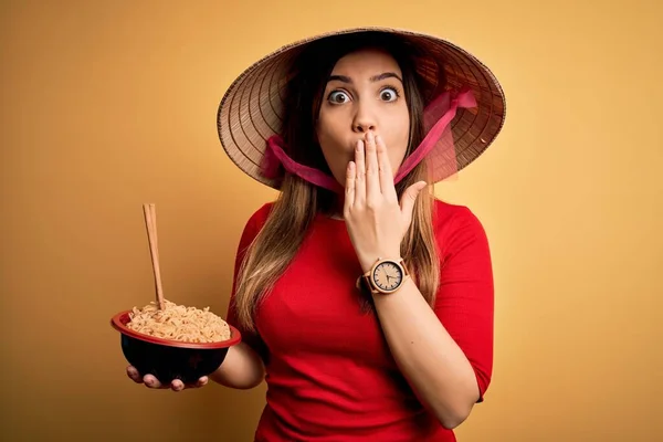 Young Woman Wearing Asian Hat Eating Chinese Noodles Yellow Isolated — Stock Photo, Image