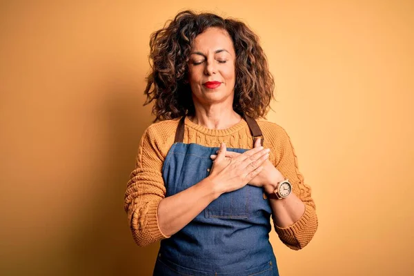 Middle Age Beautiful Baker Woman Wearing Apron Standing Isolated Yellow — Stock Photo, Image