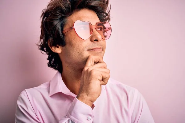 Young Handsome Man Wearing Glasses Heart Form Isolated Pink Background — Stock Photo, Image