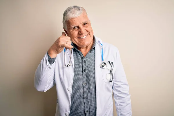 Senior Handsome Hoary Doctor Man Wearing Coat Stethoscope White Background — Stock Photo, Image