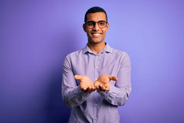 Handsome African American Man Wearing Striped Shirt Glasses Purple Background — Stock Photo, Image