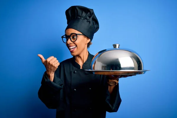 Young African American Chef Girl Wearing Cooker Uniform Hat Holding Stock  Photo by ©Krakenimages.com 358994948