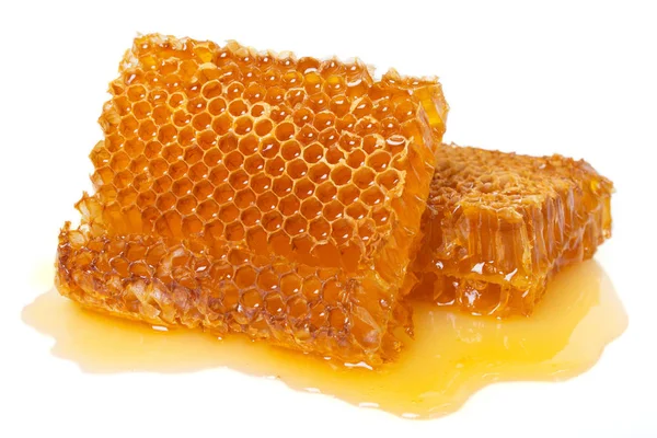 Honeycomb with honey on white background Stock Picture