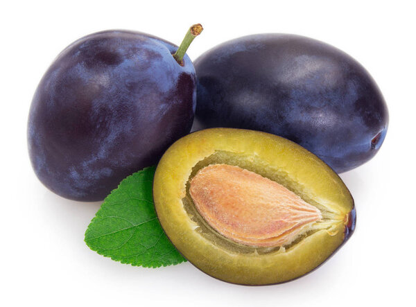 Fresh plums on white background