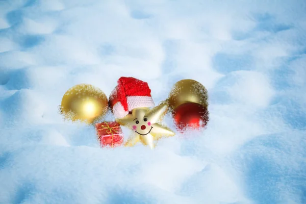 Christmas decoration on the snow — Stock Photo, Image