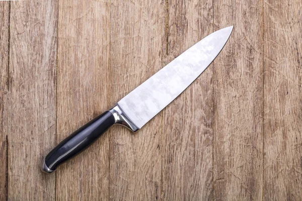 Cuchillo de cocina en la madera — Foto de Stock