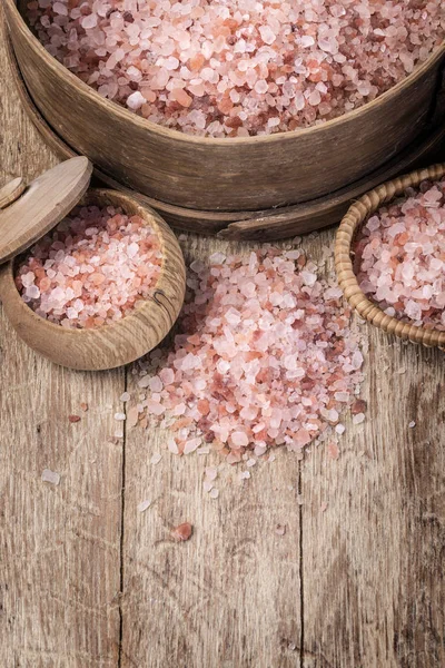 Himalayan pink salt on wooden — Stock Photo, Image