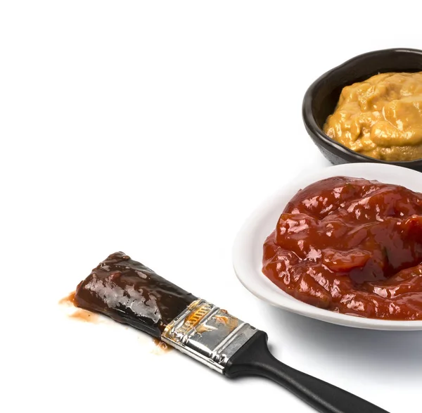 Barbecue sauce and basting brush — Stock Photo, Image