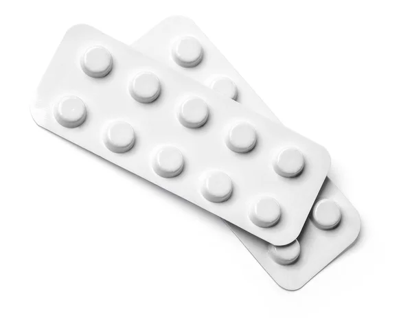 Tabletten in de strip geïsoleerd op wit — Stockfoto