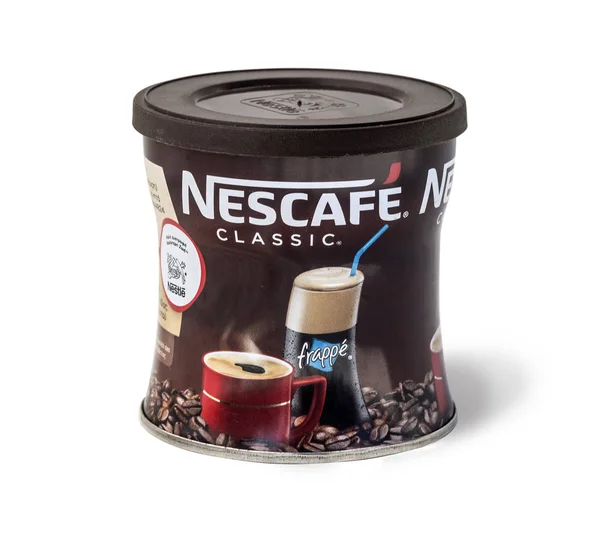 Кофейная банка Nescafe, изолированная на белом — стоковое фото