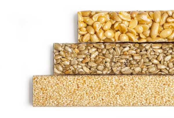 Sonnenblumenkerne, Sesam, Erdnüsse in Zuckersirup — Stockfoto