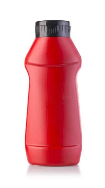 Красная бутылка кетчупа — стоковое фото