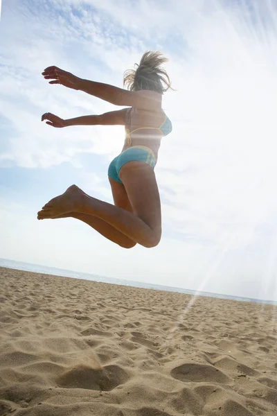 Girl Jumping Happily Sand — Stock Photo, Image