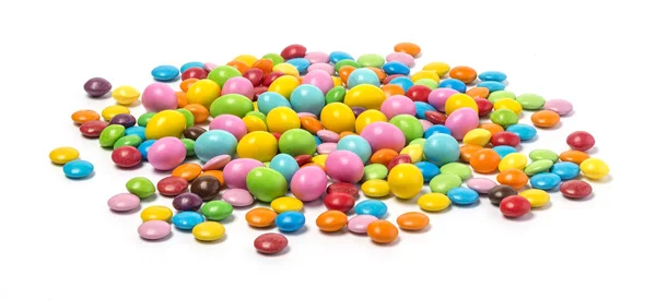 Pílulas coloridas de chocolate doce isoladas — Fotografia de Stock