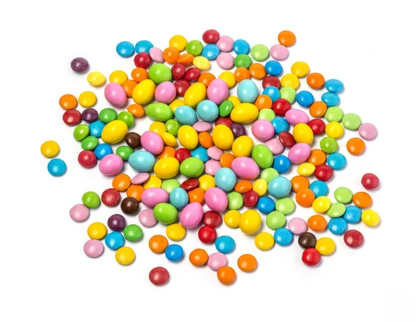 Pilules de bonbons au chocolat coloré isolé — Photo