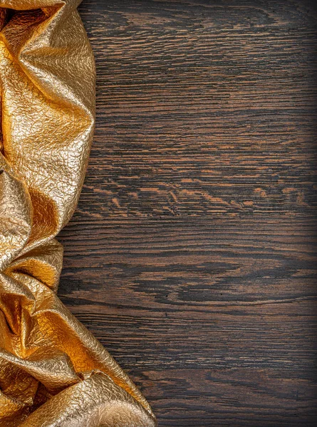 Texture scura in legno con textil oro — Foto Stock