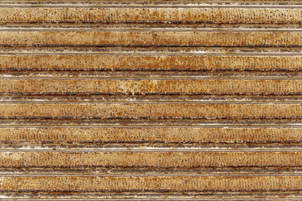 Achtergrond, oude, roestige metalen horizontale zonwering — Stockfoto