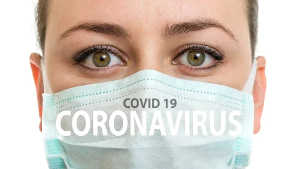  Yüzünde Coronavirus yazısıyla tıbbi maske, covid 19.