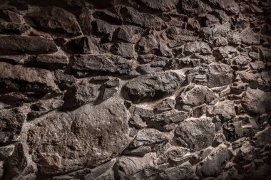 Taş bir duvarın dokusu. Eski kale taşı duvar dokusu arkaplanı